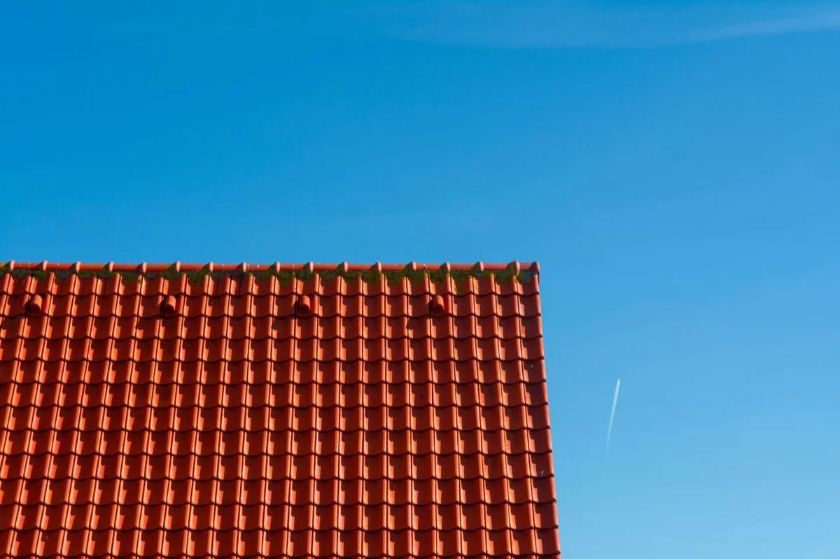 Tile roof gable in full sun, the kind of exposure that sets roof life in Tempe, AZ